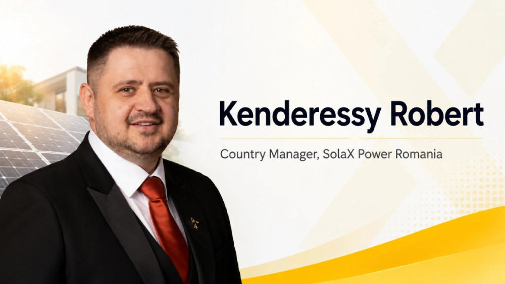 SolaX Power Romania Country Manager with solar PV background